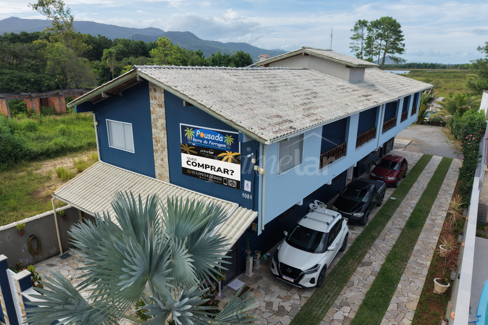 pousada barra da ferrugem com placa primelar